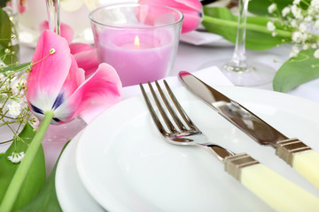 Table setting with spring flowers close up
