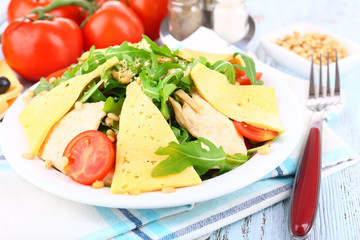 Fresh salad with arugula, close up