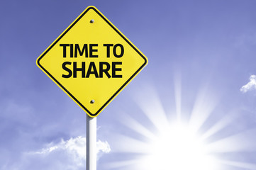 Time to Share road sign with sun background
