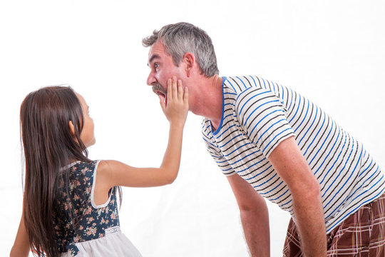 Naughty girl slapping dad