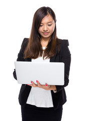 Naklejka premium Business woman look at laptop computer