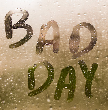 Text "BAD DAY" written in a crystal