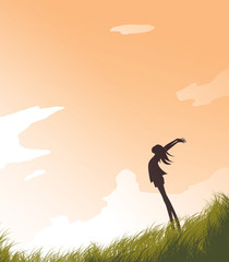 Silhouette Girl in the Field and the Evening Sky