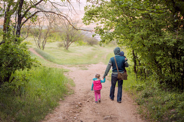 father with young daughter and son