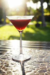 close up cocktail from strawberry juice in sunlight