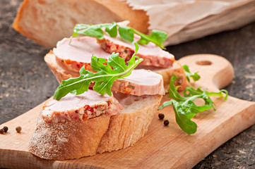 Ham sandwich decorated leaf arugula