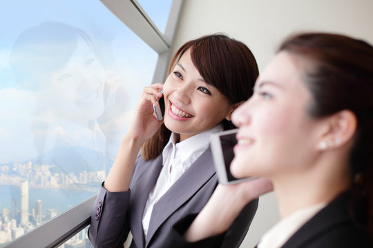 Smile Business woman speaking phone