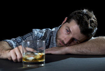 alcoholic drunk man drinking whiskey in alcoholism concept