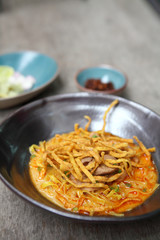 Noodle Khao soi , Thai food on wood background