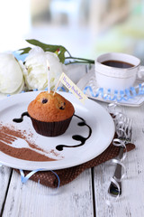 Blueberry muffin with chocolate sauce