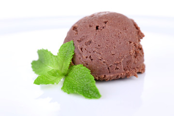 Chocolate ice cream with mint leaf, isolated on white