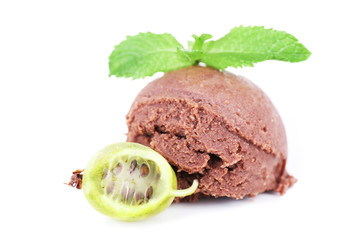 Chocolate ice cream with mint leaf and gooseberry, isolated