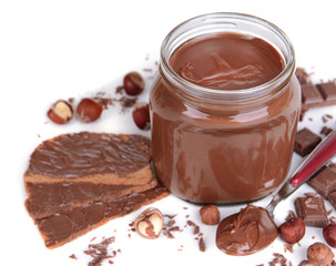 Sweet chocolate cream in jar isolated on white