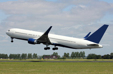 white jet taking off