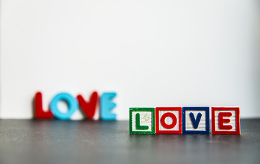 Colorful wooden word Love with white background3