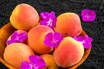 Apricots in a wooden bowl