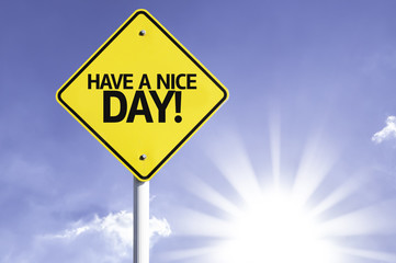 Have a Nice Day road sign with sun background