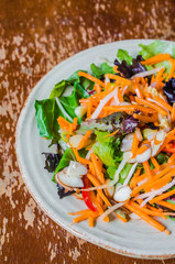 Healthy salad with carrot,almond and cheese