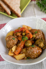 Vegetable stew with meatballs and thick gravy