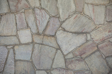 Wall paved with natural stones
