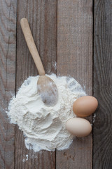 Wooden spoon with flour