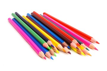 Cluster of colorful pencil crayons over a white background
