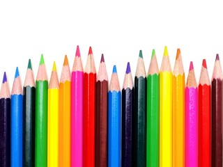 Fototapeta premium Colorful wavy pencil crayon border over white