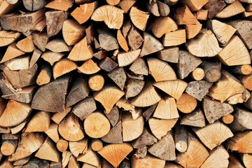 Foto op Plexiglas Stapel brandhout © massimop69