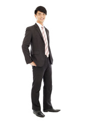 Obraz na płótnie Canvas young businessman standing and hands on pocket. isolated on whit