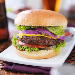 burger with fries and beer