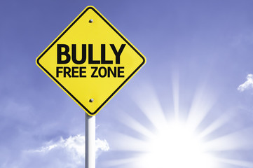 Bully Free Zone road sign with sun background