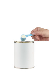 Mother prepares baby milk formula.