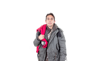 young latin guy carrying backpack