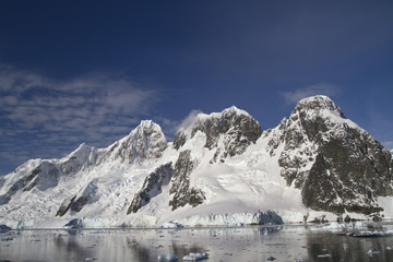 mountain range on the island near the Antarctic Peninsula sunny