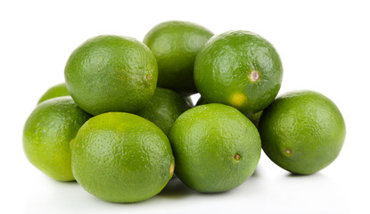 Fresh juicy limes, isolated on white