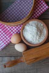 Flour with egs and rolling pin