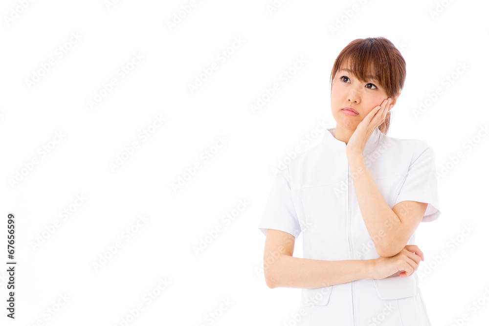 Wall mural young asian nurse on white background