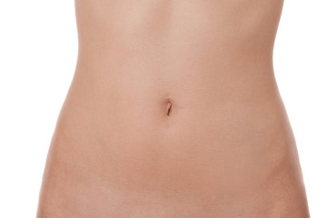 Fototapeta na wymiar Toned slender female stomach or abdomen