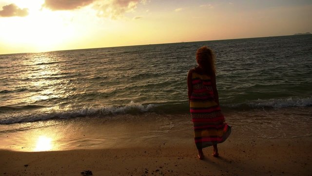 Free Woman Enjoying Freedom Feeling at Beach at Sunset. Slow