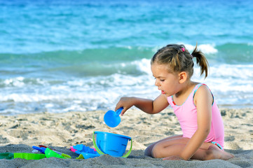 Toddler girl at beach