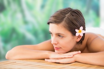 Obraz na płótnie Canvas Close up of a beautiful woman on massage table