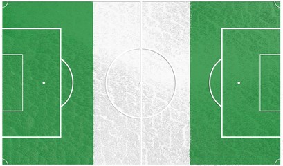 football field textured by nigeria national flag