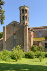 Fototapeta na wymiar church transept and bell tower. Abbadia Cerreto