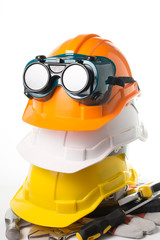 Safety hat and goggles glasses isolated