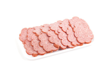 Sliced sausage in the package isolated on a white background