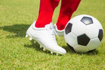 Soccesr player and ball isolated