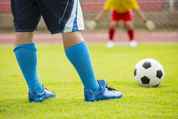 Soccer player preparing free kick