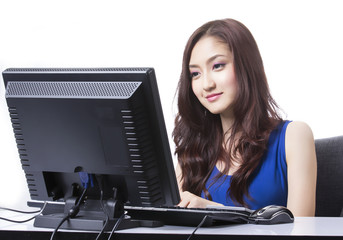 Asian girl use PC computre for search and do something