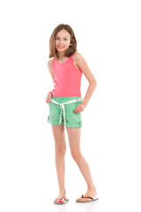 Shy girl holding hands in pockets