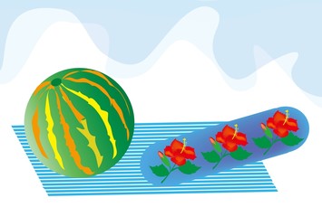 スイカのビーチボールと海辺のイメージ